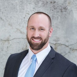 professional headshot of Damon S. Mortensen, white man with dark hair and beard